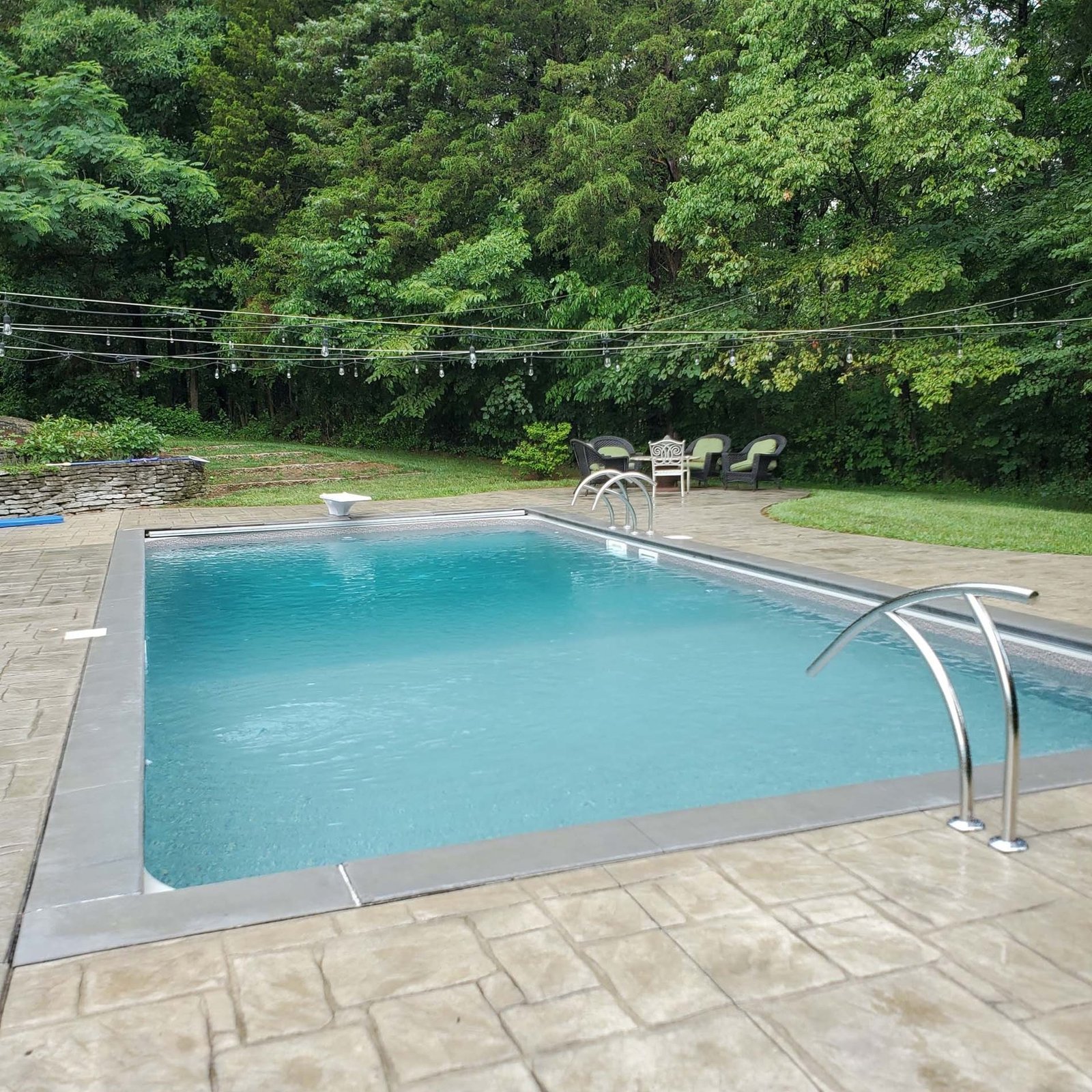 Pool remodel and finished backyard work by Madison Pool and Spa