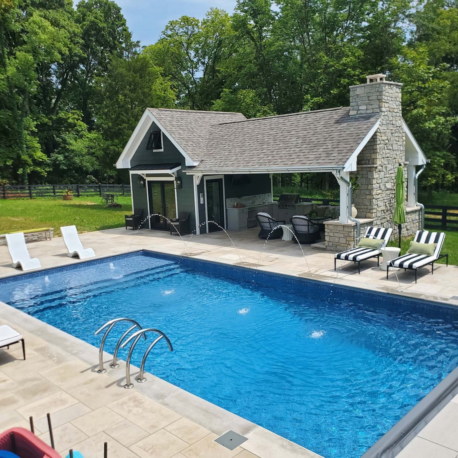 Pool remodel and finished backyard work by Madison Pool and Spa